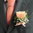 ORANGE ROSE GROOM BUTTONHOLE 2